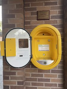 Empty defibrilator cabinet