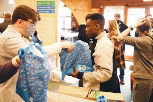 50th anniversary goodies bag being handed over